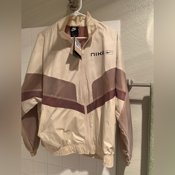Nike Jackets & Blazers - Brand new with tags women’s Nike Windbreaker Size M